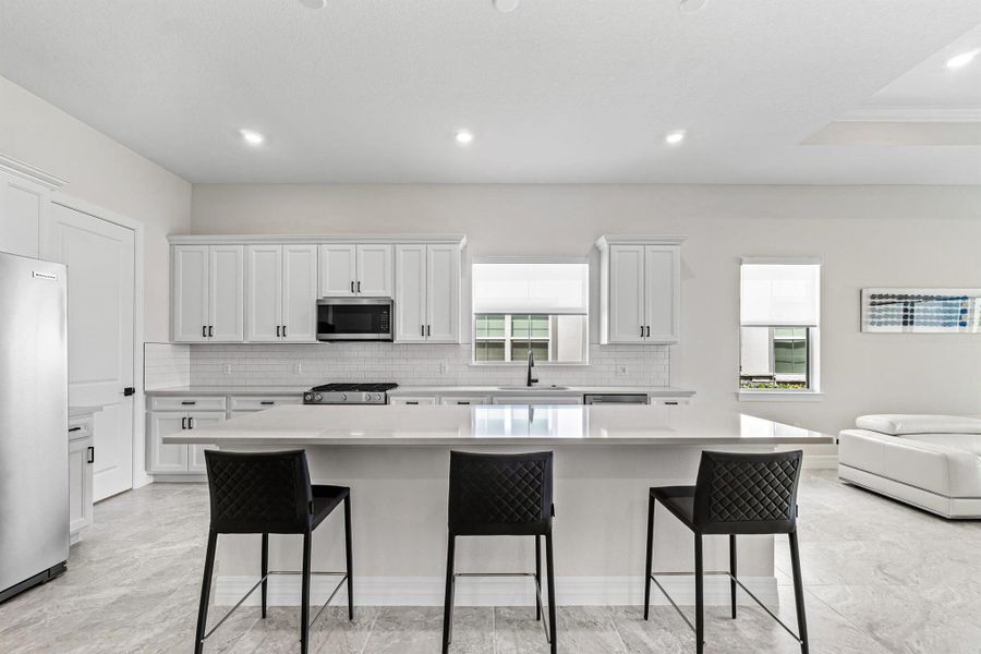 Furnished interior view inside a new home in Avondale at Avenir, Palm Beach Gardens (Image 49).
