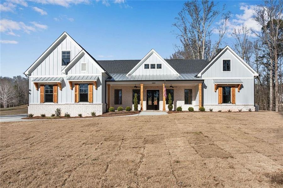 Front exterior of a new home in , Hiram, GA, highlighting curb appeal (Image 30).