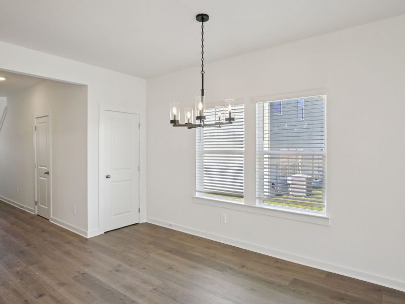 The open-concept floorplan allows for an easy flow between the kitchen and dining areas.