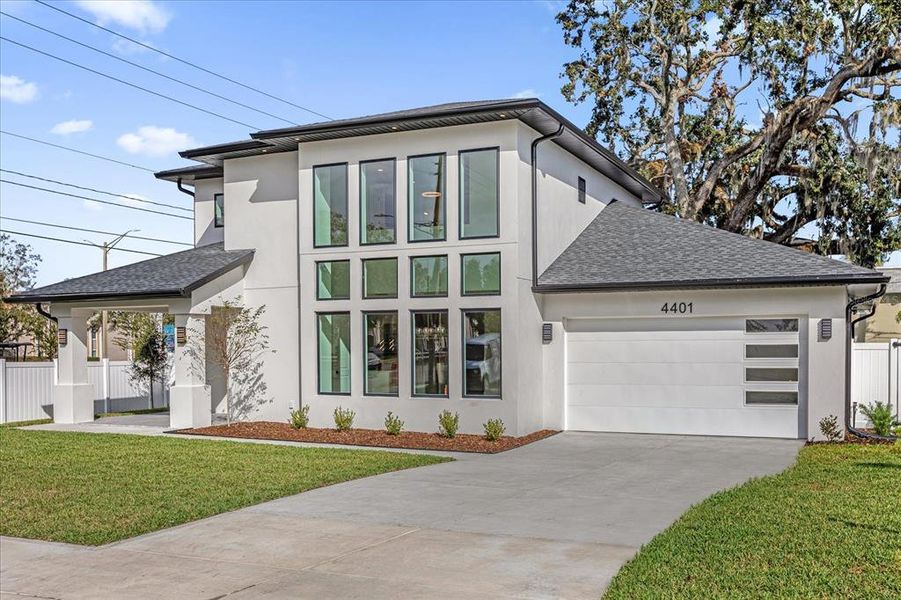 Front exterior of a new home in , Orlando, FL, highlighting curb appeal (Image 27).