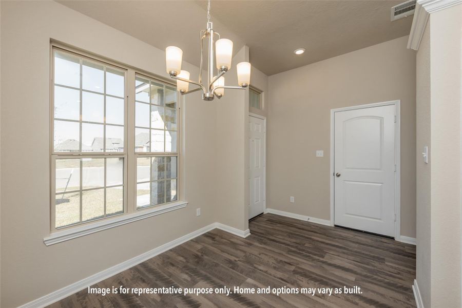 Unfurnished dining area with dark wood-style flooring, a chandelier, and recessed lighting