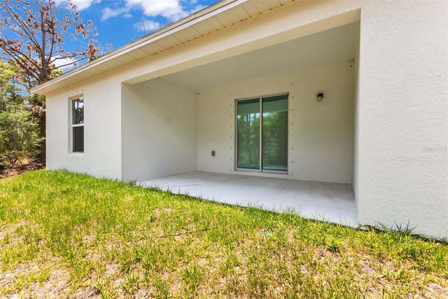 Exterior details and patio area of a home in , Port Charlotte (Image 3).