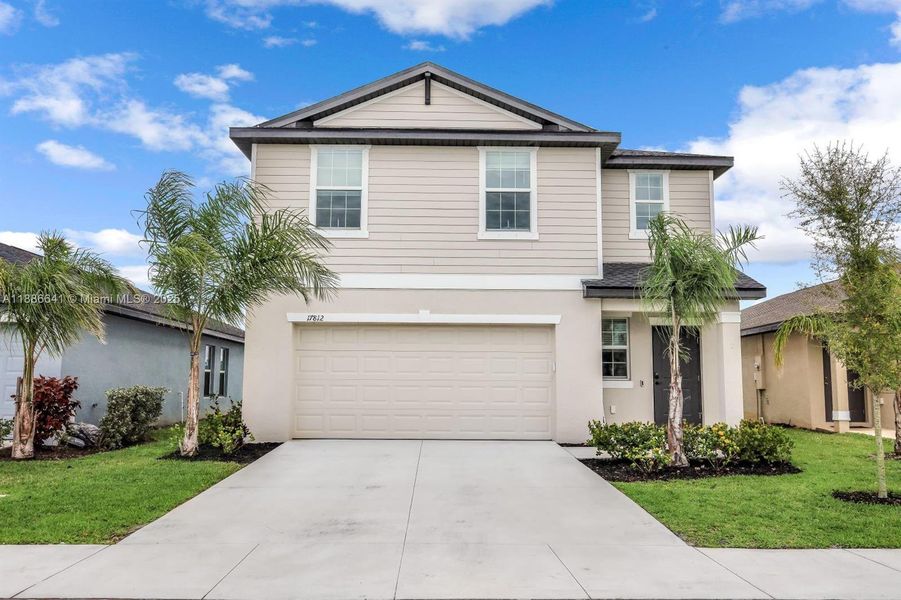 Front exterior of a new home in , North Fort Myers, FL, highlighting curb appeal (Image 2).