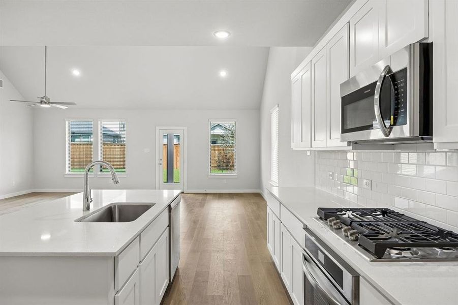 Kitchen in the Winters home plan by Trophy Signature Homes – REPRESENTATIVE PHOTO