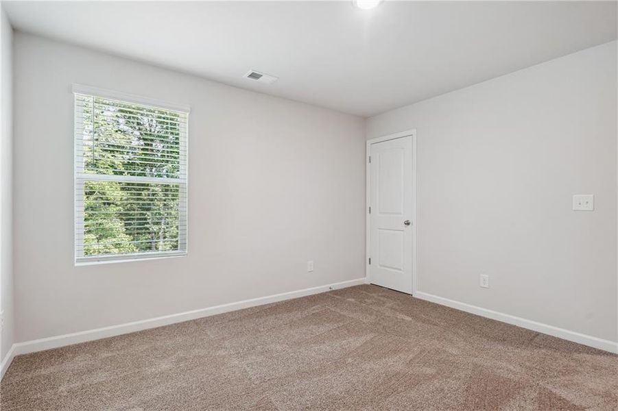 Spacious, unfurnished interior of a new home in River Walk Farm, Covington (Image 21).