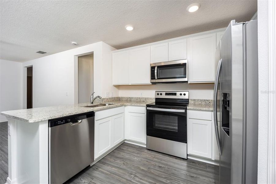 Furnished interior view inside a new home in Gum Lake Preserve, Lake Alfred (Image 4). Furnished interior view inside a new home in Gum Lake Preserve, Lake Alfred (Image 4).