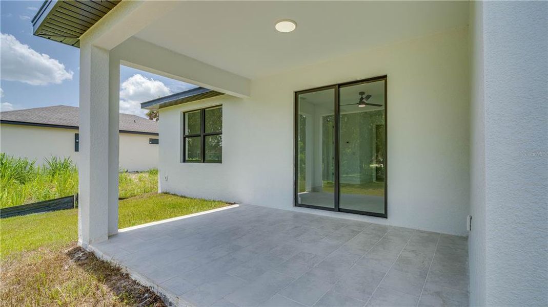 Exterior details and patio area of a home in , Lehigh Acres (Image 32). Exterior details and patio area of a home in , Lehigh Acres (Image 32).