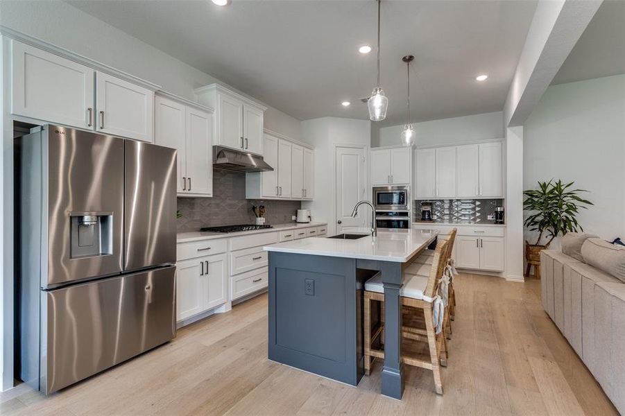 Furnished interior view inside a new home in Reunion 60s, Rhome (Image 5).