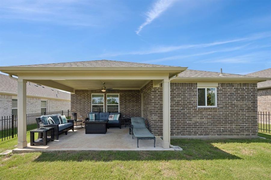 View of the back of the home. Notice there is no siding.