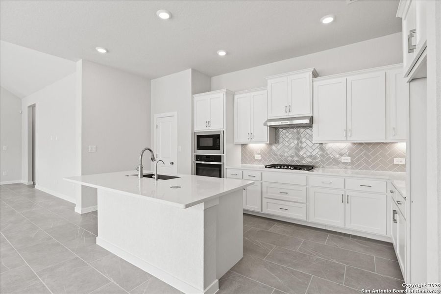 Furnished interior view inside a new home in Village at Three Oaks, Seguin (Image 4).
