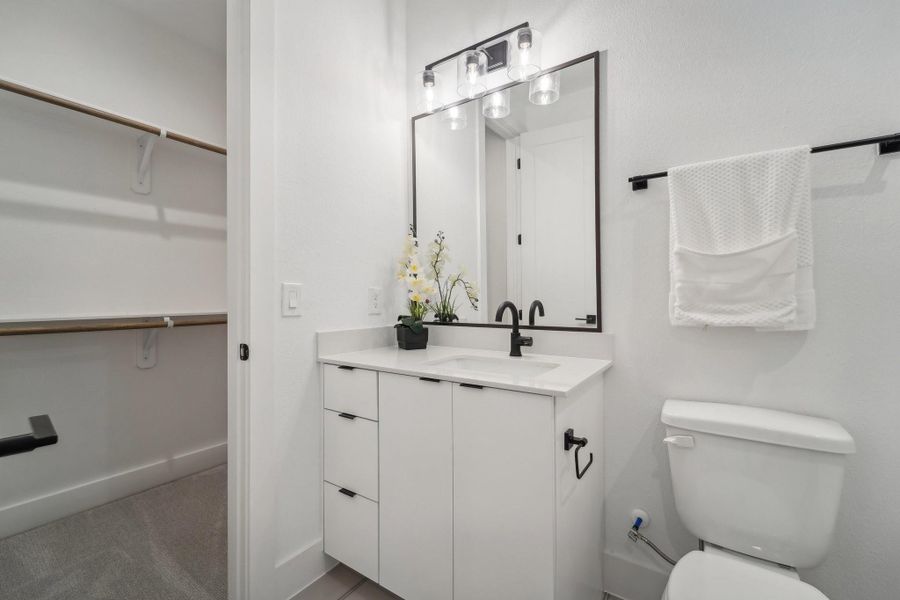 Photos show similar floor plan & alternative finishes from the previous development. Selections may vary.