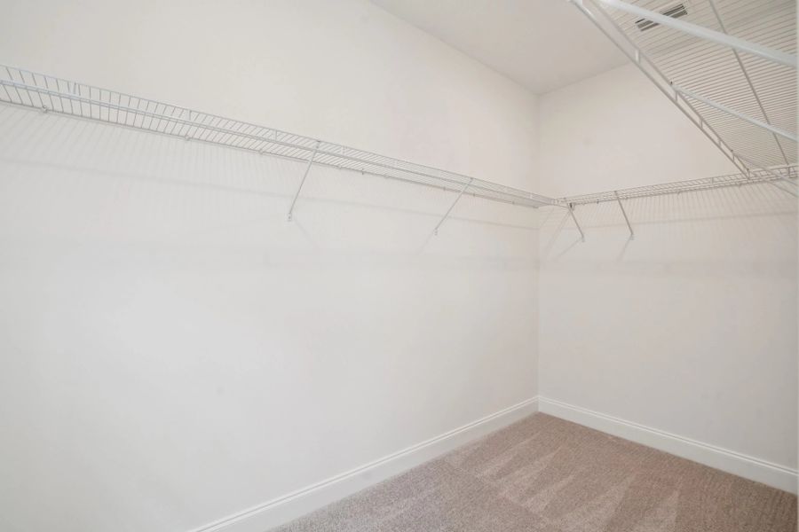 Primary Walk-in Closet | For representation purposes only. Options and layout may vary by community and home plan. Primary Walk-in Closet | For representation purposes only. Options and layout may vary by community and home plan.