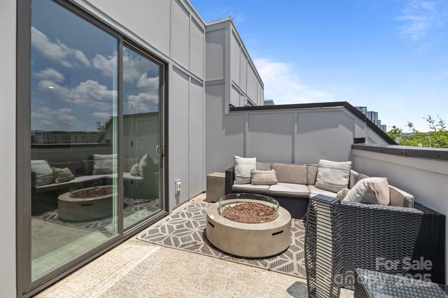Exterior details and patio area of a home in , Charlotte (Image 1).