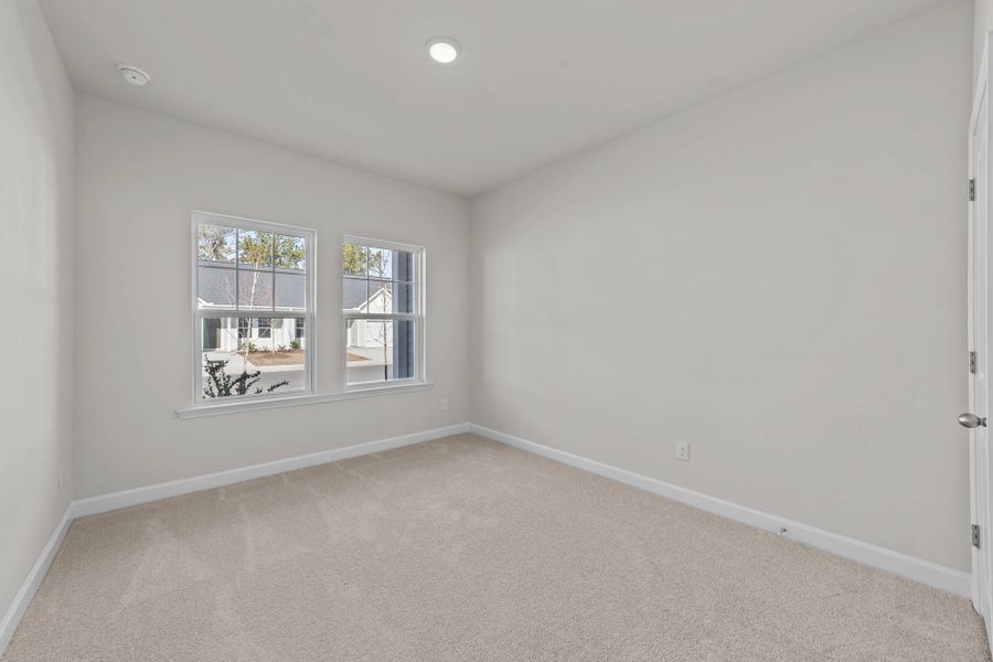 Spacious, unfurnished interior of a new home in Blue Heron Retreat: Villas, Little River (Image 14).