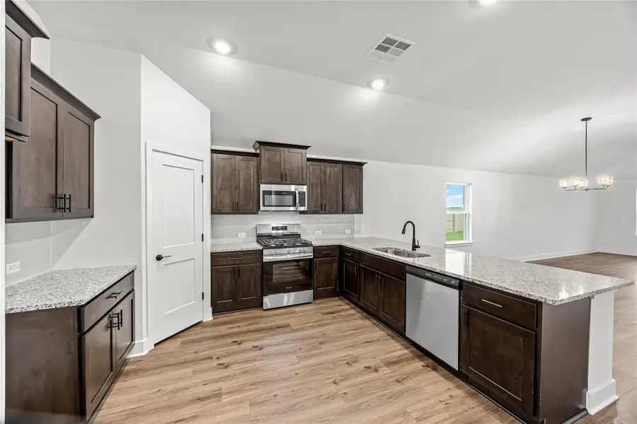 Furnished interior view inside a new home in River Ranch Trails, Dayton (Image 3).