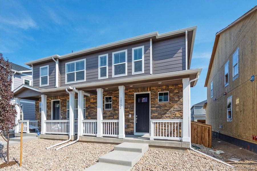 Exterior details and patio area of a home in Revere at Johnstown, Johnstown (Image 2).