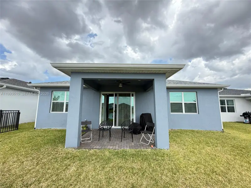 Exterior details and patio area of a home in Tradition, Port St. Lucie (Image 3).