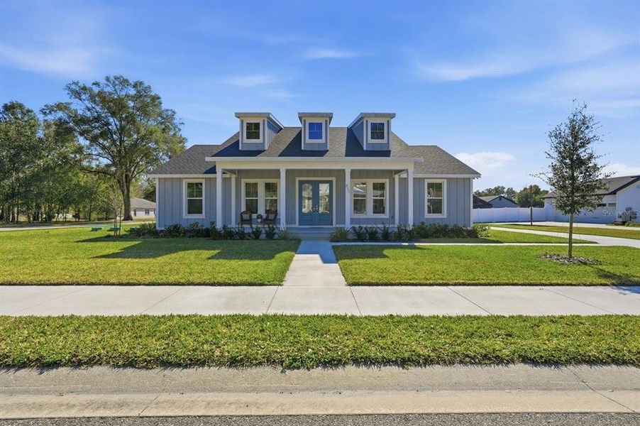 Front exterior of a new home in , Lake Helen, FL, highlighting curb appeal (Image 28).