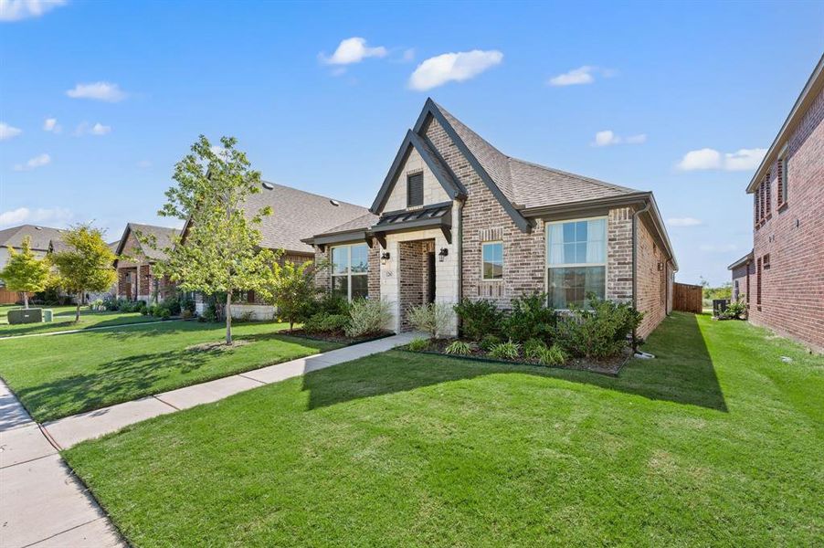 Front exterior of a new home in , Justin, TX, highlighting curb appeal (Image 23).