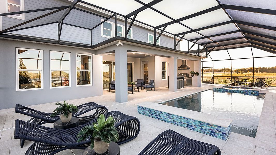 Exterior details and patio area of a home in Lochside, Mount Dora (Image 2). Exterior details and patio area of a home in Lochside, Mount Dora (Image 2).