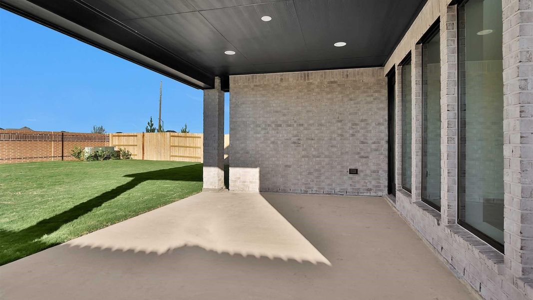 Exterior details and patio area of a home in Elyson 55', Katy (Image 4). Exterior details and patio area of a home in Elyson 55', Katy (Image 4).
