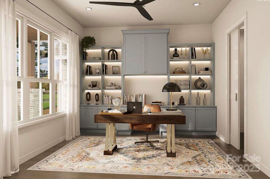 This beautifully designed home office features custom built-ins with soft blue cabinetry, warm accent lighting, and open shelving for stylish storage and display. This beautifully designed home office features custom built-ins with soft blue cabinetry, warm accent lighting, and open shelving for stylish storage and display.