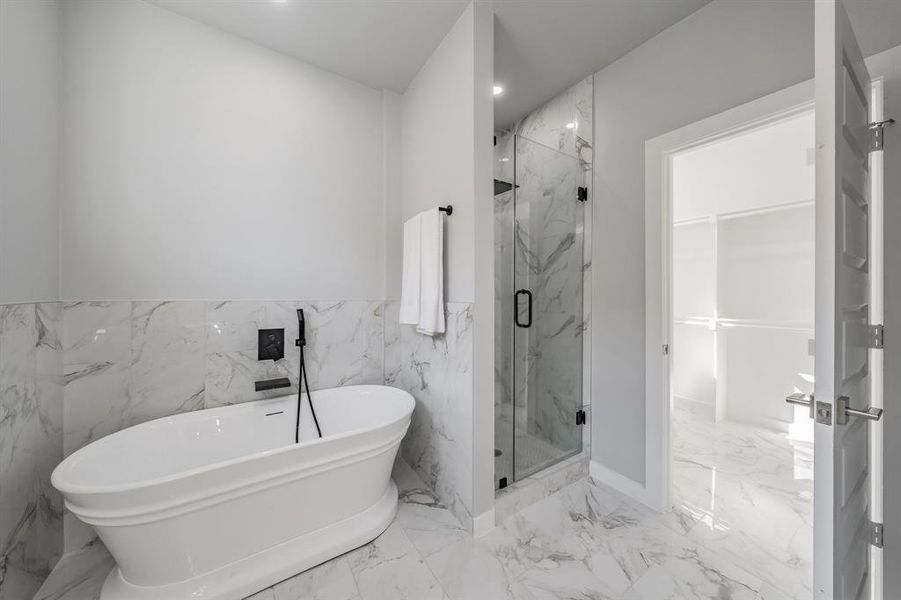 Bathroom with independent shower and bath