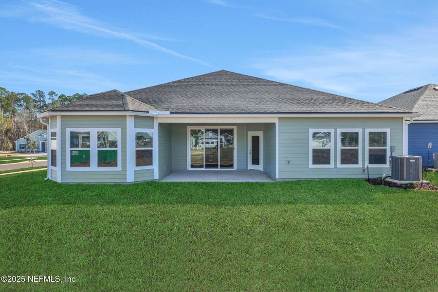 Front exterior of a new home in , Middleburg, FL, highlighting curb appeal (Image 24). Front exterior of a new home in , Middleburg, FL, highlighting curb appeal (Image 24).