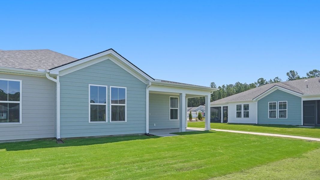 Exterior details and patio area of a home in Sun City Hilton Head, Bluffton (Image 3).