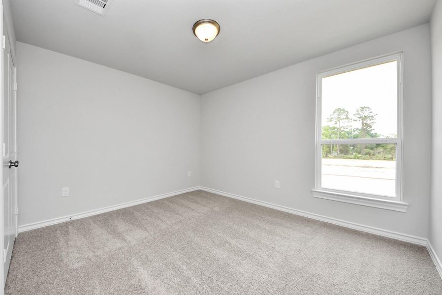Spacious, unfurnished interior of a new home in The Enclave at Spring Branch, Conroe (Image 34).