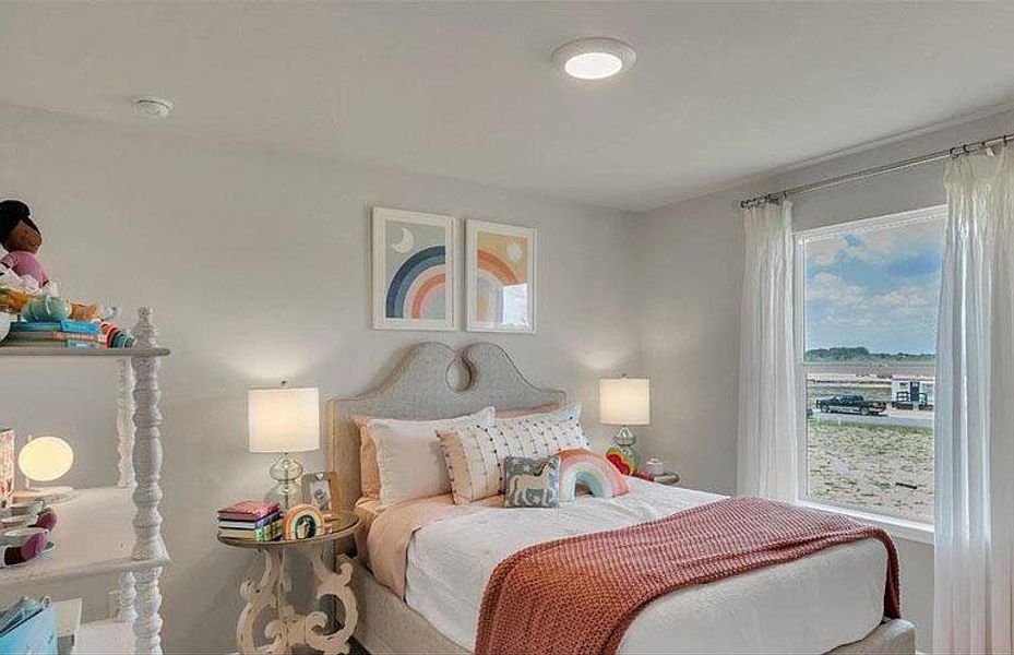 Bedroom featuring multiple windows Bedroom featuring multiple windows