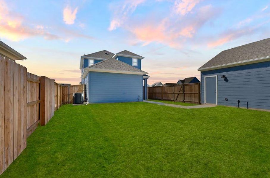 Rear of Home and Private Backyard