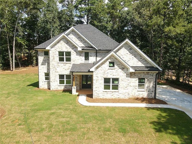 Front exterior of a new home in , McDonough, GA, highlighting curb appeal (Image 21).