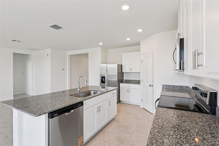 Furnished interior view inside a new home in Crosswinds - Signature Series, Haines City (Image 15).