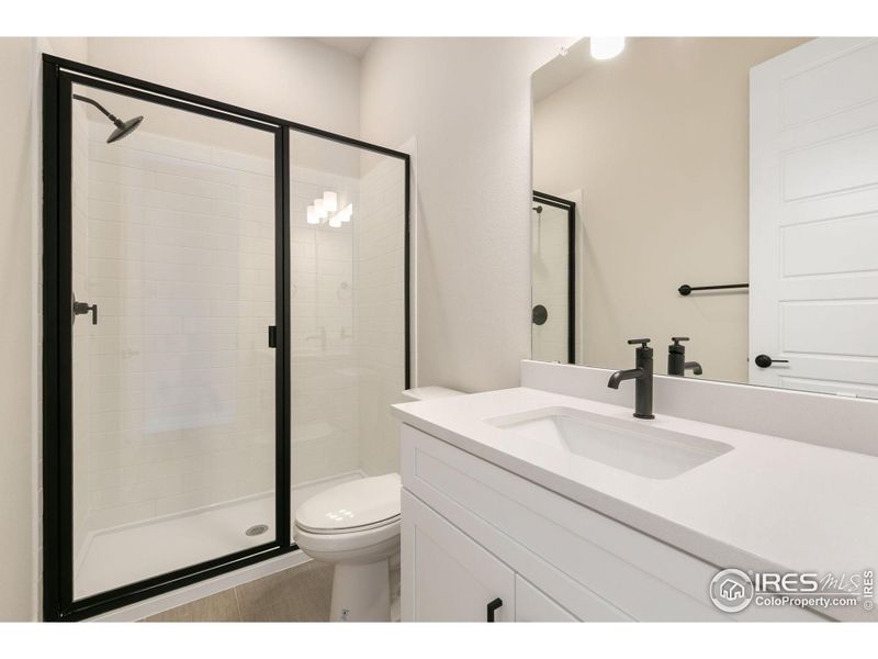 Furnished interior view inside a new home in Festival at RainDance, Windsor (Image 5).