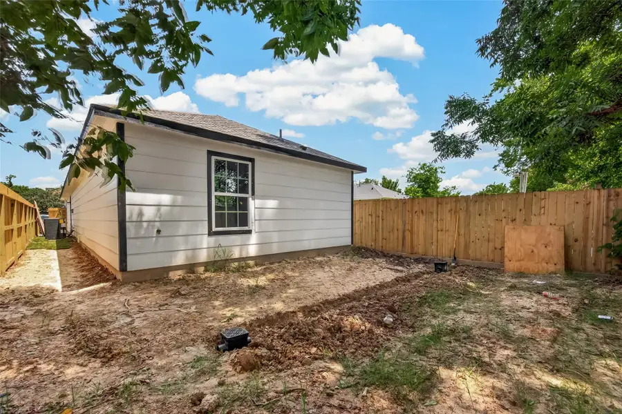 Exterior details and patio area of a home in , Houston (Image 3).