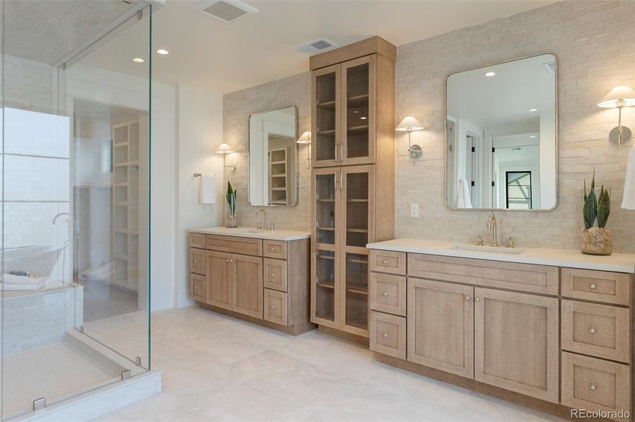 Stunning double vanities + tower cabinet