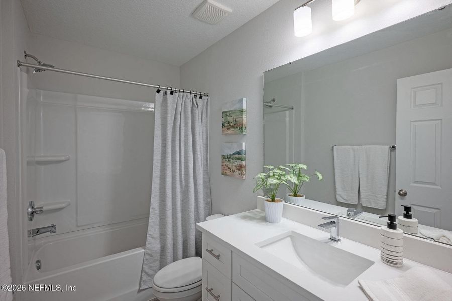 Furnished interior view inside a new home in , Jacksonville (Image 42).