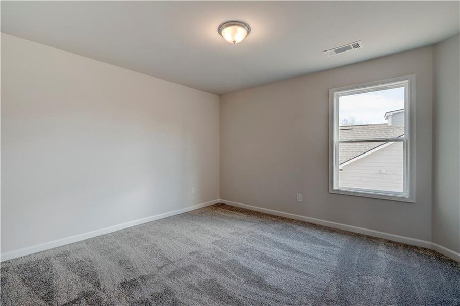 Spacious, unfurnished interior of a new home in Enclave at Logan Point, Loganville (Image 22).
