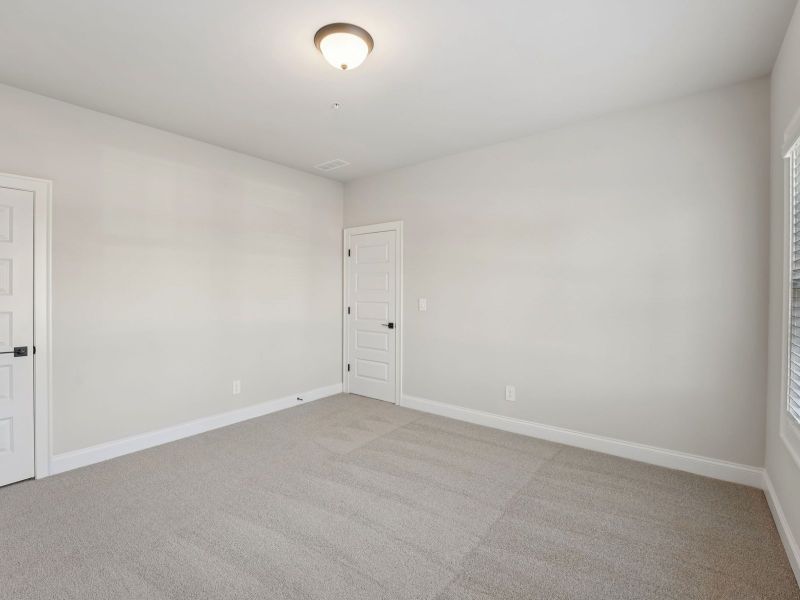 Spacious, unfurnished interior of a new home in Hemingway - Highland Series, Cumming (Image 18).