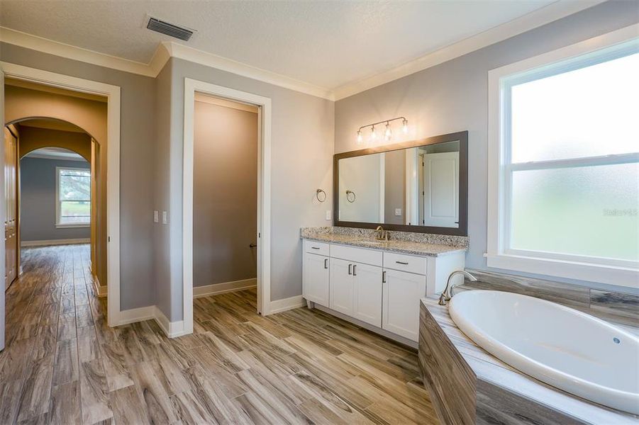Furnished interior view inside a new home in , Dunnellon (Image 11).