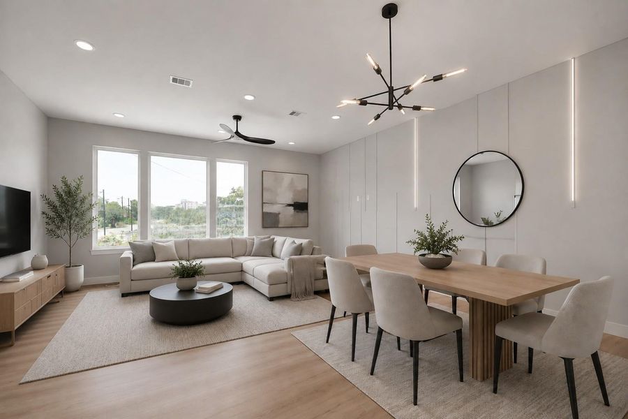 Open-concept living & dining space with designer lighting, oversized windows, & warm modern finishes throughout. Thoughtfully designed for both comfortable living & effortless entertaining.