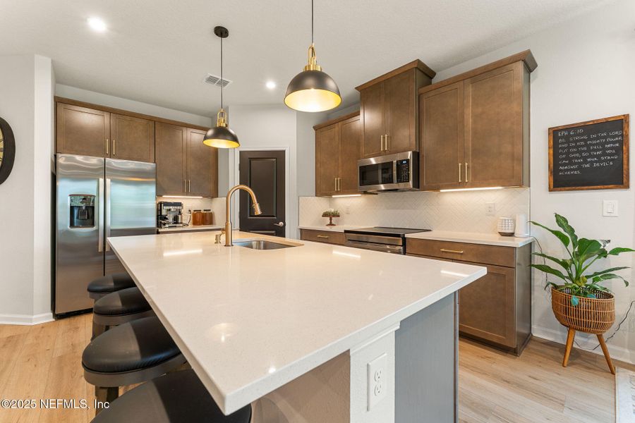 Furnished interior view inside a new home in Seminole Palms Single-Family Homes, Palm Coast (Image 35).