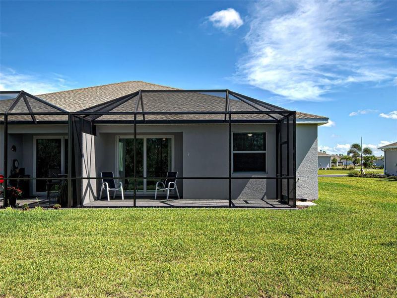 Front exterior of a new home in , Englewood, FL, highlighting curb appeal (Image 22).