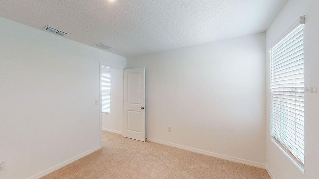 Spacious, unfurnished interior of a new home in Solena, North Fort Myers (Image 23). Spacious, unfurnished interior of a new home in Solena, North Fort Myers (Image 23).