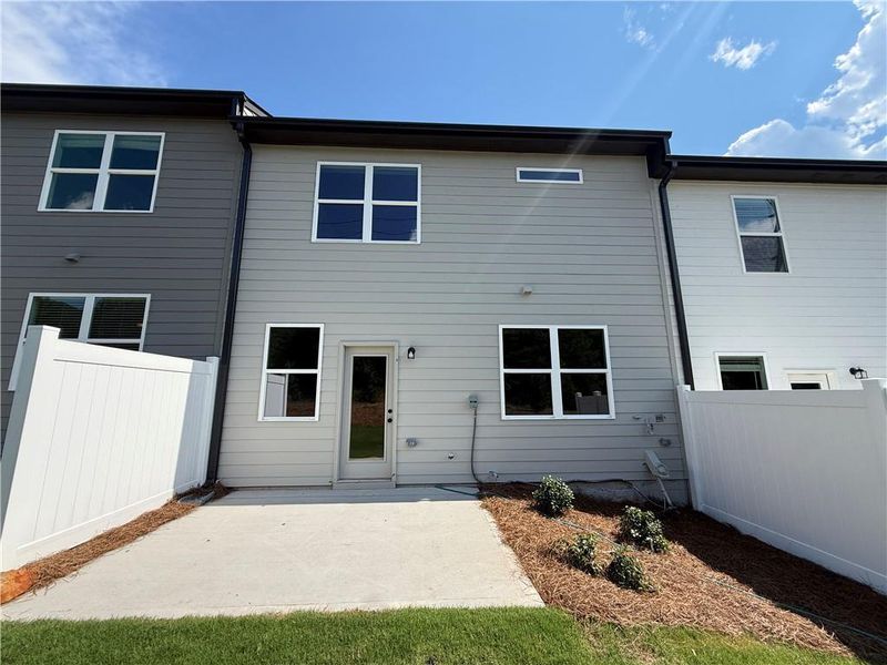 Exterior details and patio area of a home in The Towns at Auburn Station East, Auburn (Image 16).