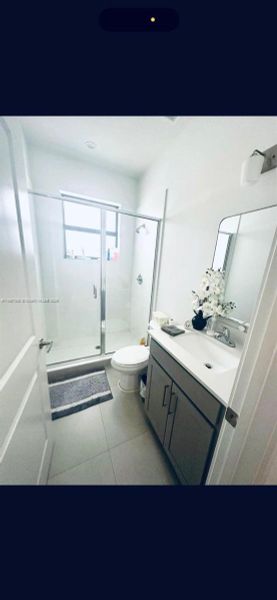 Furnished interior view inside a new home in Century Royal Homes, Homestead (Image 6).