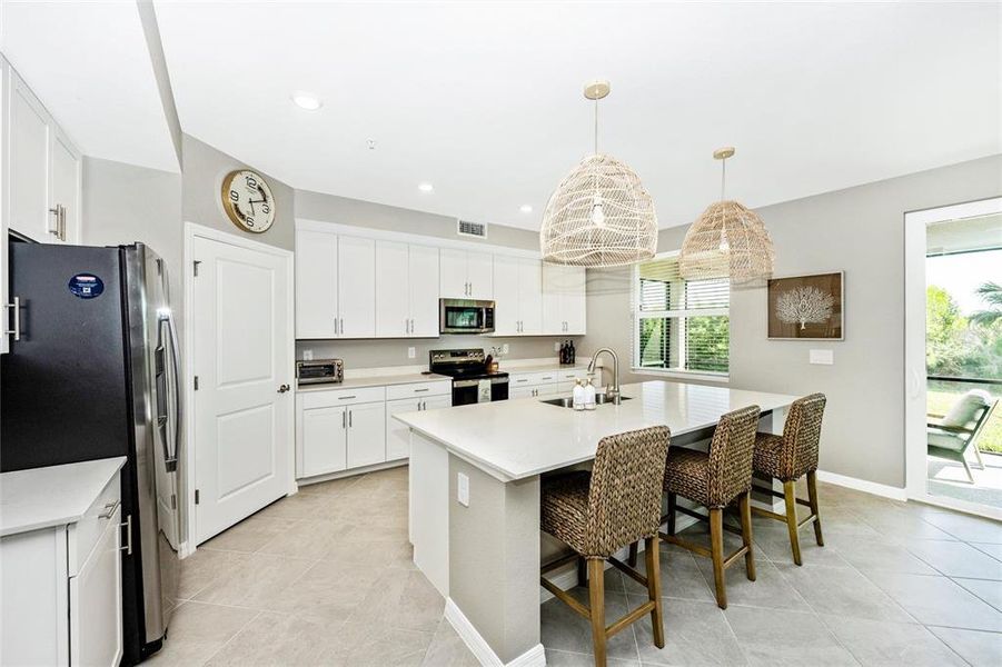 Furnished interior view inside a new home in Wellen Park Golf & Country Club, Venice (Image 33).
