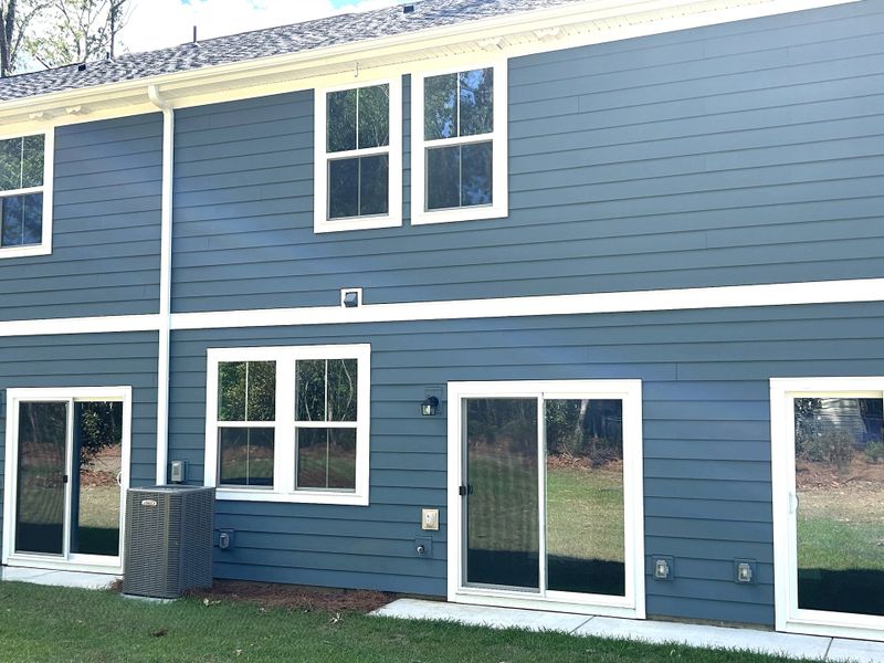 Exterior details and patio area of a home in Windward Village, Summerville (Image 3).