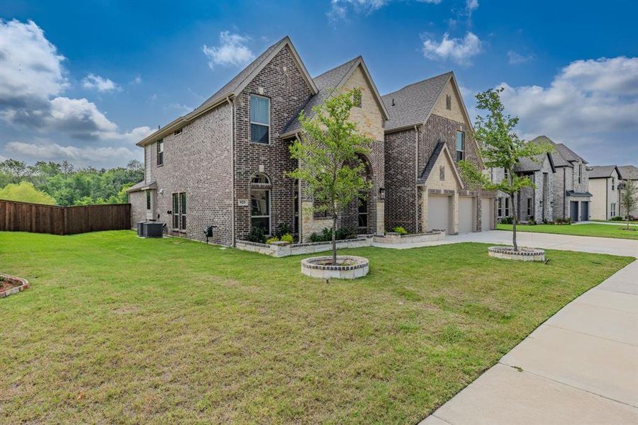 Front exterior of a new home in Grayhawk Addition, Forney, TX, highlighting curb appeal (Image 22).